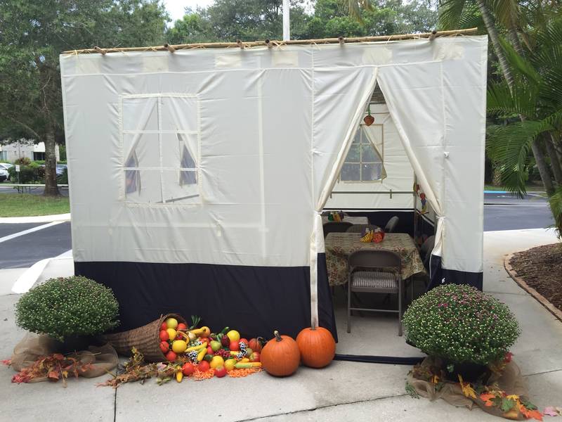 Sukkah outside Temple Shalom with fall decorations