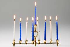menorah with blue and white candles